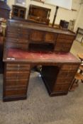 LATE 19TH CENTURY OAK TWIN PEDESTAL OFFICE DESK WITH RED LEATHER WRITING SURFACE, 115 CM WIDE