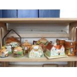 MIXED LOT: VARIOUS COTTAGE FORMED TEAPOTS, CHEESE DISH, MONEY BOX ETC TO INCLUDE BESWICK AND OTHERS