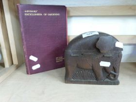 HARDWOOD ELEPHANT FORMED CIGARETTE BOX TOGETHER WITH AN ENCYCLOPEDIA OF GARDENING