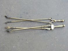 TWO PAIRS BRASS FIRE TONGS