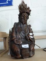 20TH CENTURY SOUTH EAST ASIAN CARVED WOODEN DEITY