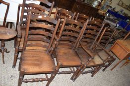 SET OF EIGHT OAK LADDER BACK DINING CHAIRS