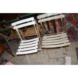 TWO VINTAGE METAL FRAMED FOLDING CHAIRS