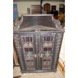 LATE VICTORIAN DARK OAK AND LEAD GLAZED TWO DOOR CORNER CABINET