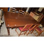 20TH CENTURY RECTANGULAR DRAW LEAF DINING TABLE TOGETHER WITH SIX DINING CHAIRS, THE TABLE IS 183 CM