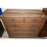 LATE 19TH CENTURY OAK COMBINATION BOOKCASE CHEST WITH GLAZED TOP SECTION OVER A BASE FITTED WITH
