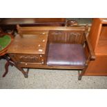 OAK TELEPHONE SEAT WITH CARVED DECORATION