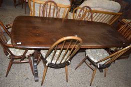 ERCOL DARK ELM REFECTORY TYPE DINING TABLE AND SIX STICK BACK CHAIRS