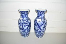 PAIR OF IRON STONE BLUE AND WHITE VASES