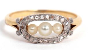 Small pearl and diamond ring featuring three graduated seed pearls in an openwork design framed with