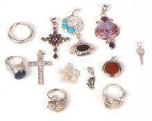 Mixed lot of mainly white metal jewellery to include four rings, two swivel fobs, seven pendants,