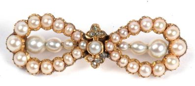 Vintage seed pearl and diamond bow brooch set throughout with graduated seed pearls and