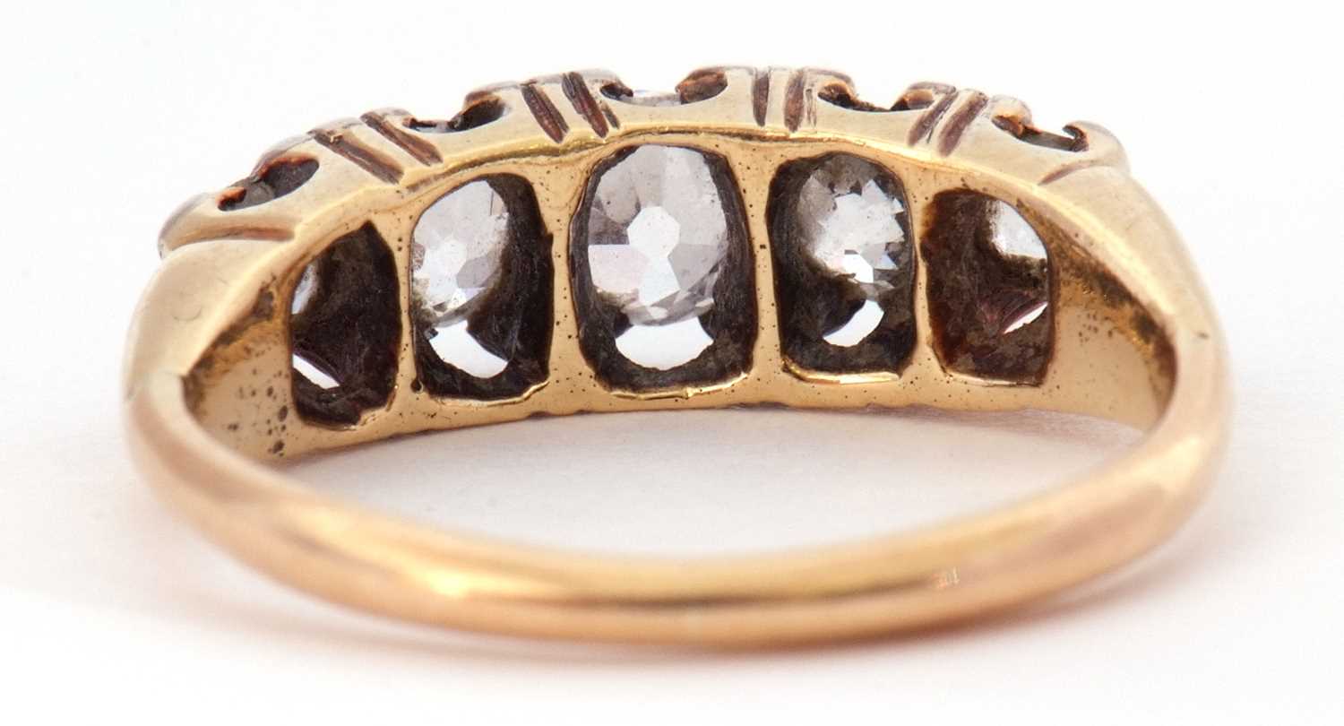Antique 5 stone diamond ring featuring five old cut diamonds individually claw set in a pierced - Image 5 of 7