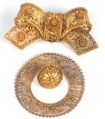 High grade yellow metal filigree two part brooch of etruscan style typically decorated with beads