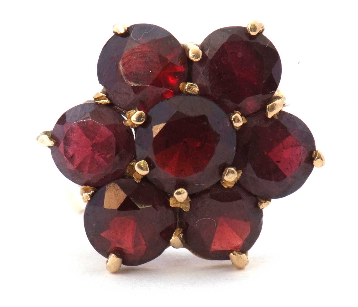 9ct gold large garnet cluster ring featuring seven round garnets, head size 18mm diameter, all in
