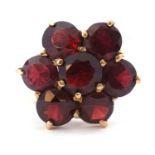 9ct gold large garnet cluster ring featuring seven round garnets, head size 18mm diameter, all in