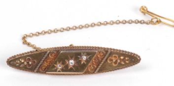Antique 15ct gold diamond etruscian style brooch of lozenge shape centering three small graduated