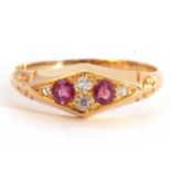 Antique ruby and diamond ring, lozenge shaped, centering two round cut rubies highlighted with