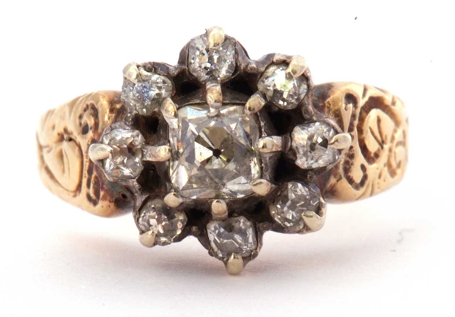 Diamond cluster ring centering an old cushion cut diamond surrounded by seven small old cut diamonds - Image 2 of 9