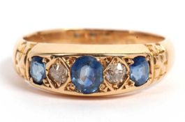 Antique 18ct gold sapphire and diamond ring featuring three graduated oval sapphires and two old cut