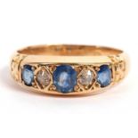 Antique 18ct gold sapphire and diamond ring featuring three graduated oval sapphires and two old cut