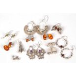 Mixed lot of eleven pairs of white metal earrings to include three amber examples, g/w 70.3gms