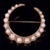 9ct gold and seed pearl crescent shaped brooch set with seventeen graduated seed pearls,