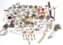 Quantity of costume jewellery to include brooches, bracelets, watches etc