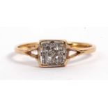 Antique diamond ring, the square panel set with four old cut diamonds between split shoulders,