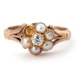 Diamond seed pearl cluster ring, the flower head design centering a small round old cut diamond 0.