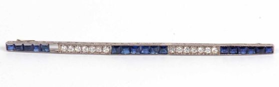 Art Deco blue stone and diamond brooch of elongated form with pave set calibre cut blue stones
