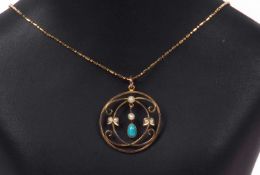 Turquoise and seed pearl open work pendant, a scroll design with a central turquoise and seed