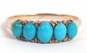 Antique turquoise and diamond ring featuring five graduated oval cobochon turquoises highlighted