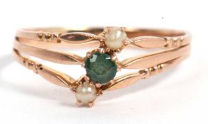 Emerald and pearl ring design featuring three bands, the centre band highlighted with a small
