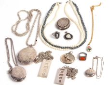 Mixed lot to include two silver ingot pendants with oversized hallmarks, both on white metal chains,