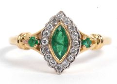 18ct gold emerald and diamond ring centering a lozenge shaped emerald within a small diamond