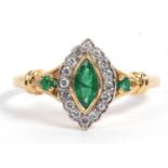 18ct gold emerald and diamond ring centering a lozenge shaped emerald within a small diamond
