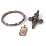 Mixed lot to include a hallmarked silver hinged bracelet, a Victorian silver babies rattle, together
