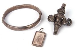 Mixed lot to include a hallmarked silver hinged bracelet, a Victorian silver babies rattle, together