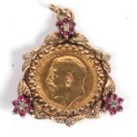 George V half sovereign dated 1911 framed in a ruby and diamond pendant mount, g/w 7.5gms
