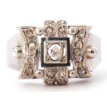 Diamond cluster ring centering a single cut diamond in an illusion box setting surrounded by small