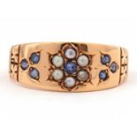 Antique 18ct gold sapphire and pearl ring centering a seed pearl and sapphire set flower head