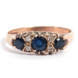 9ct gold sapphire and diamond ring, design with three graduated round cut sapphires highlighted