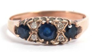9ct gold sapphire and diamond ring, design with three graduated round cut sapphires highlighted