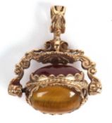 9ct gold triple sided swivel fob consists of three stones, carnelian, onyx and tiger eye