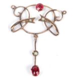 9ct stamped open work pendant set with red stones and sea pearls