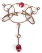 9ct stamped open work pendant set with red stones and sea pearls