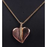 Clogau 9ct rose Welsh gold heart and diamond pendant, the heart shaped pendant highlighted with a