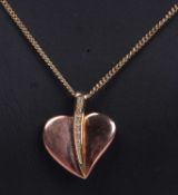Clogau 9ct rose Welsh gold heart and diamond pendant, the heart shaped pendant highlighted with a