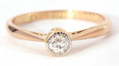 Single stone diamond ring, a round brilliant cut diamond 0.15ct app, bezel set and raised between